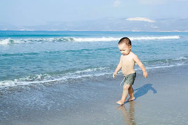 Baby Walking on the Beach