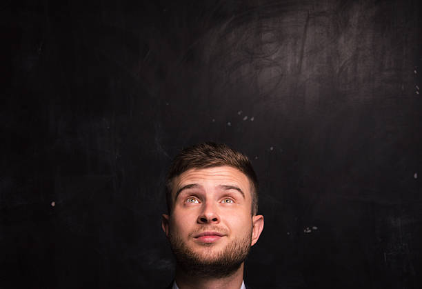 istock Portrait of thinking man 609088848