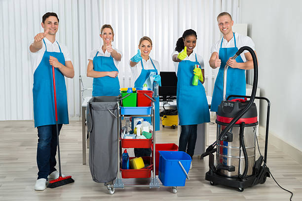 istock Cleaners With Cleaning Equipments In Office 609089250