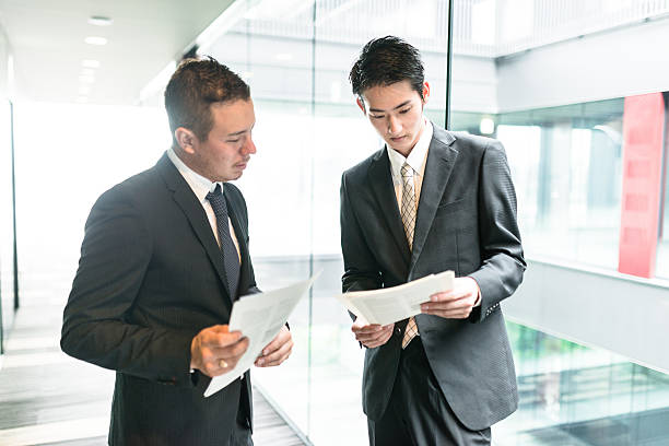 istock businessman meeting on the financial district building 609089292