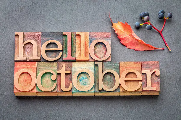 Photo of hello October word abstrtact in wood type