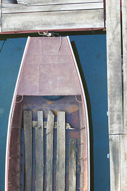 istock Rusty wooden fisherman boat from above 609093846