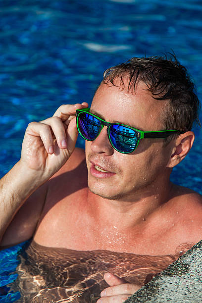 istock The man in the blue pool 609094650