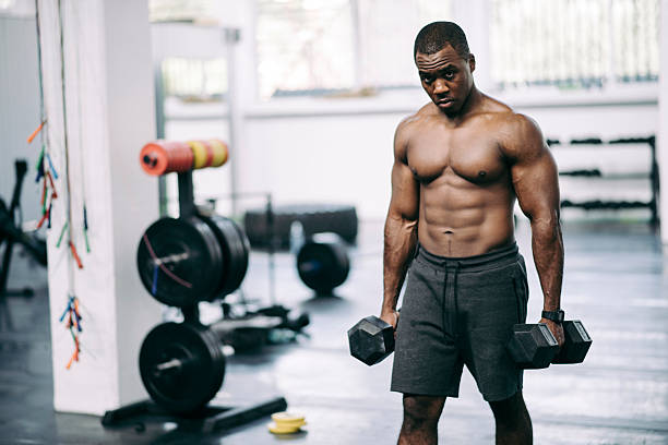 bodybuilder in palestra - men black body building african descent foto e immagini stock