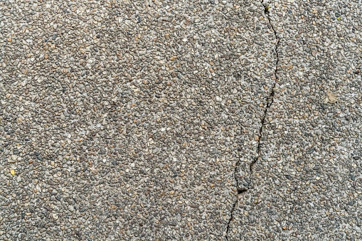 Cracked brown Gravel concrete texture background