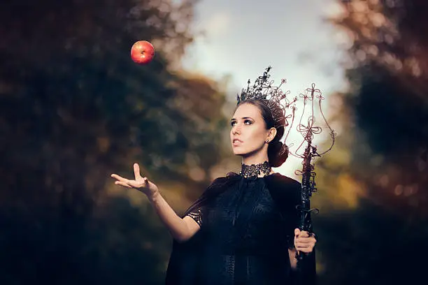 Beautiful dark princess using black magic spell