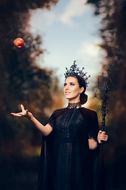istock Evil Queen with Poisoned  Apple in Fantasy Portrait 609431336