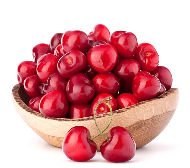 istock cherry berries in wooden bowl 609435558