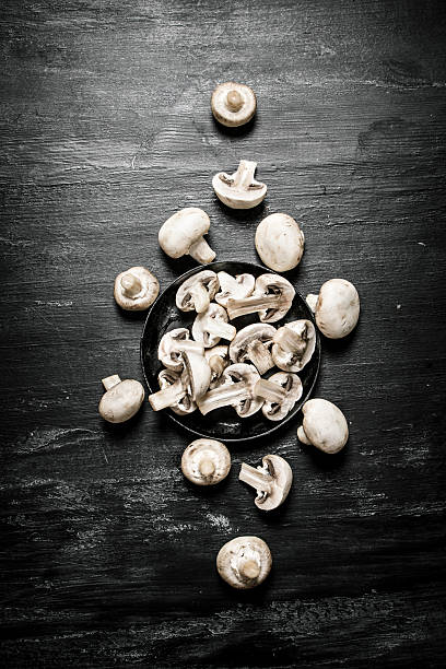 istock Sliced mushrooms in the pan. 609441128
