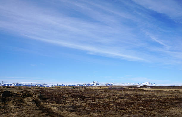 istock Beautiful Meadow landscape with snow mountain background 609441614