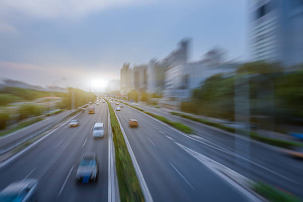 istock blurred street scene in city 609441856