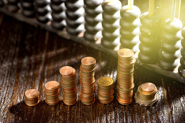 istock group of gold coin 609441874