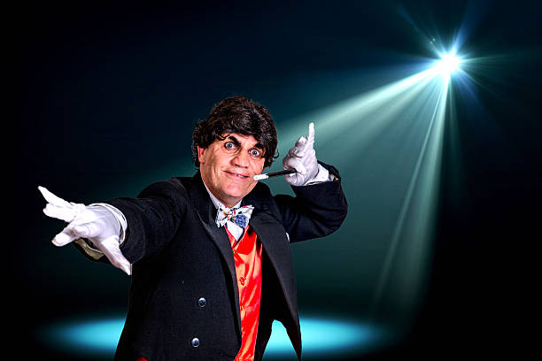 istock Magician with his wand 609442850