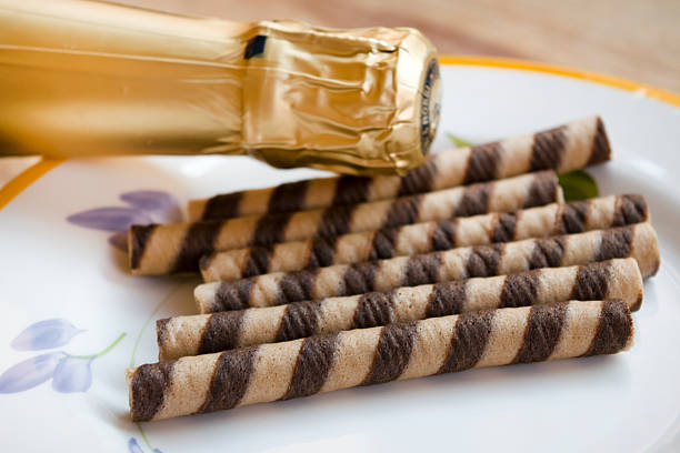 istock rolled wafer at the chocolate champagne bottle 609533062