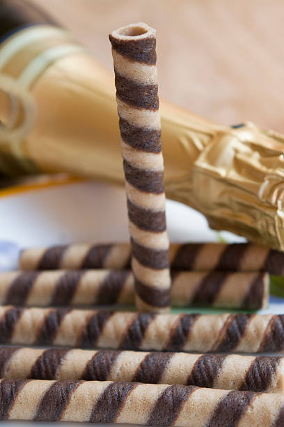 rolled wafer at the chocolate champagne bottle
