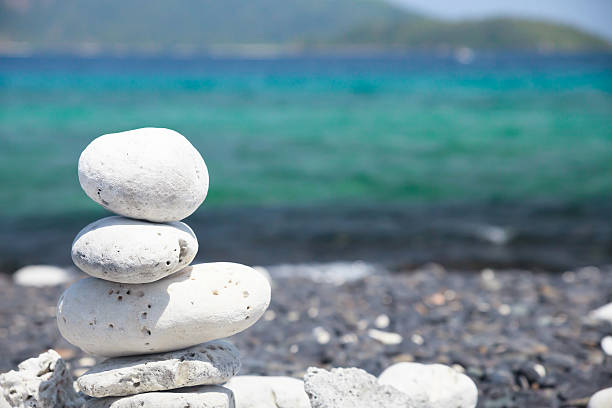 Stones balance on the beach. Stones balance on the beach. Stones on Hin Ngam Island, Tarutao National Park, Thailand. tarutao stock pictures, royalty-free photos & images