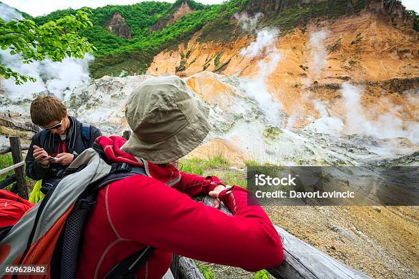 Tourists Enjoying On Hell Valley Trail On Hokkaido Japan Stock Photo - Download Image Now