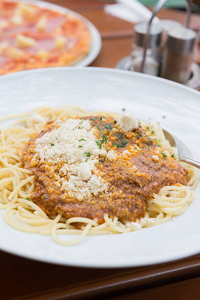 istock Spaghetti bolognese with parmesan cheese. Selective focus. 609628710