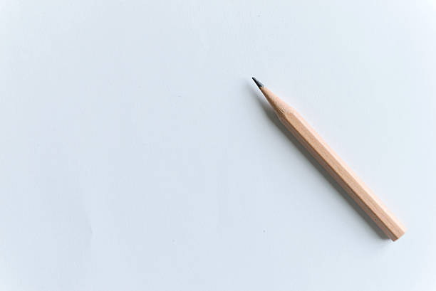 istock Wooden Pencils on white paper with copy space 609683426