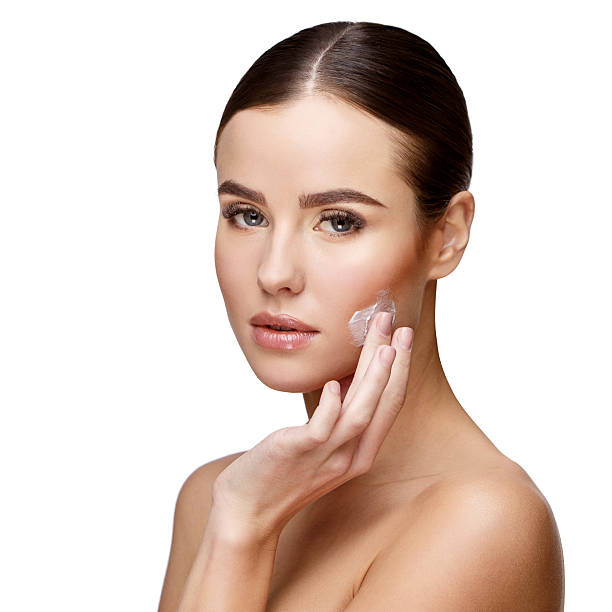 istock Beautiful Young Woman with Clean Fresh Skin 609684868
