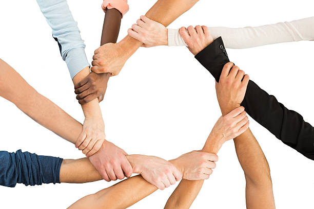istock Creative Business People Holding Each Other's Hand Showing Unity 609685892