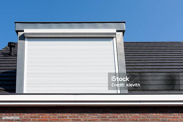 Dormer Window With Rolling Safety Shutter Stock Photo - Download Image Now - Rolling, Shutter, Window