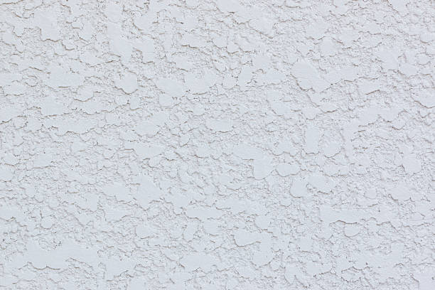 istock Texture of white cement gravel concrete wall 609691502