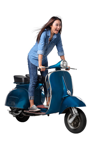 Asian woman riding scooter isolated over white background