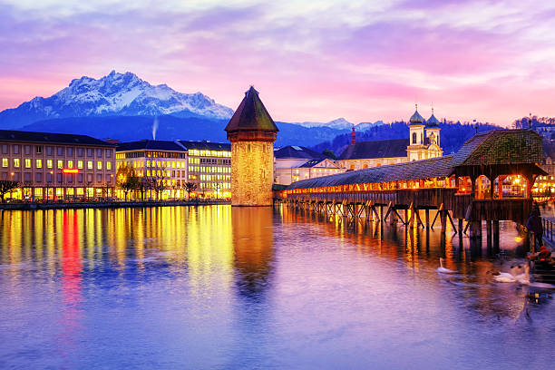 istock Chapel bridge and Mount Pilatus on sunset, Lucerne, Switzerland 609692382