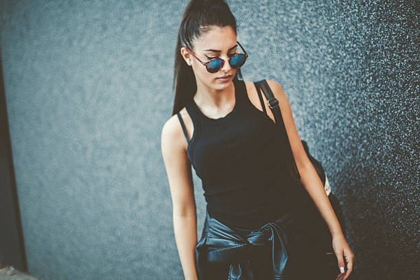 istock Young woman in the city 609694544