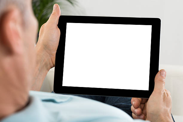 istock Person Hand Holding Tablet With Blank Screen 609694688