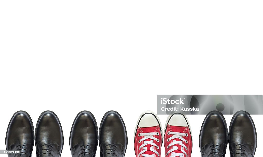 red sneakers and man business shoes Shoe Stock Photo