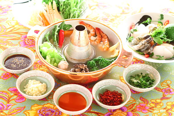 istock Healthy creative Thai hot pot with shrimp, mushroom, broccoli, o 609700774