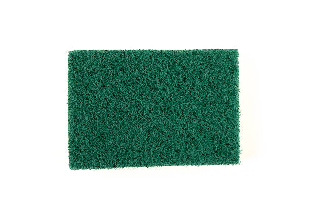 istock Underneath of yellow sponge on white background 609700982