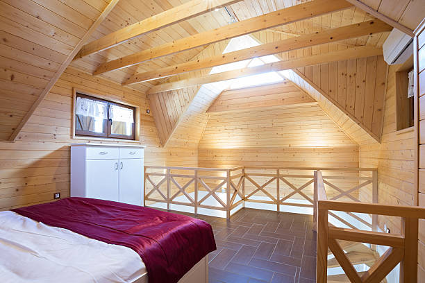 bedroom in modern style log house - rustic bedroom cabin indoors imagens e fotografias de stock