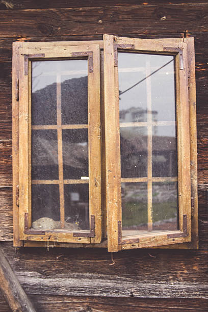 istock window of old wooden house 609702286