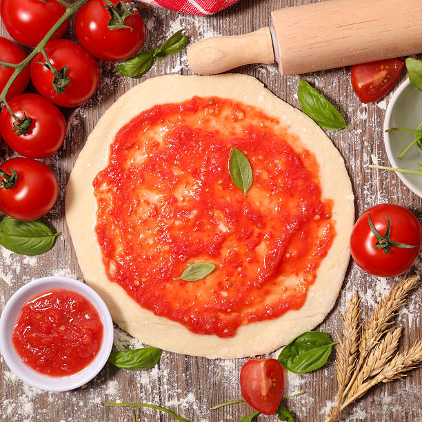 istock fresh italian raw pizza preparation 609704852