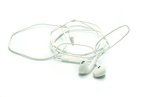 istock white earphones on a white background 609709726