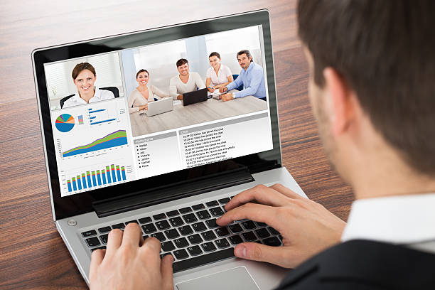 istock Businessman Video Conferencing On Laptop 609709842