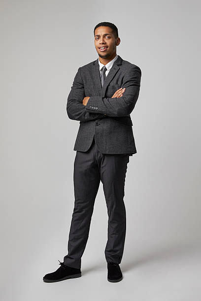 istock Studio Portrait Of Businessman Wearing Suit 609710578