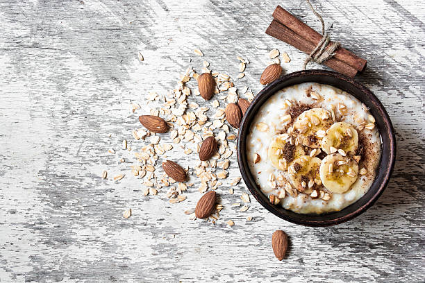 istock oatmeal porridge in ceramic bowl. healthy breakfast 609710636