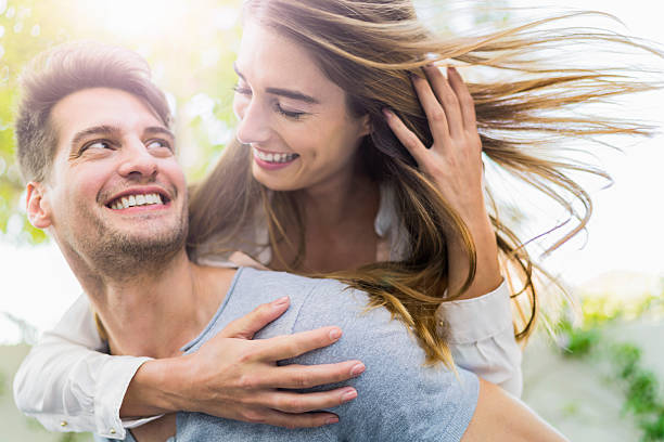 istock Happy couple having fun on sunny day 609711780