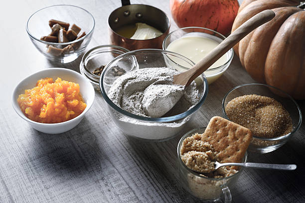 istock Ingredients for pumpkin dump cake on the white table  horizontal 609717694