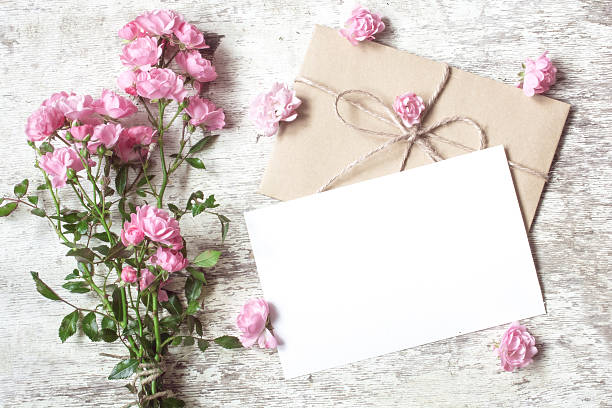 istock blank white greeting card with pink rose flowers bouquet 609719316
