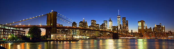 brooklyn bridge panorama - new york city brooklyn bridge night zdjęcia i obrazy z banku zdjęć
