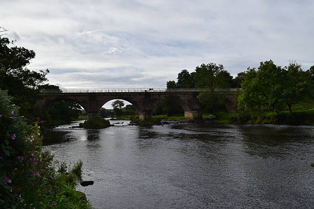 istock Four arches of Laigh Milton Viaduct, downstream view 609720584