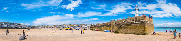 tourists enjoying beach harbour seaside resort st ives panorama cornwall - family child crowd british culture imagens e fotografias de stock