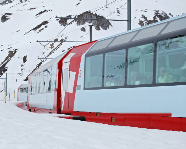 Glacier Express in winter on the Oberalp pass stock photo