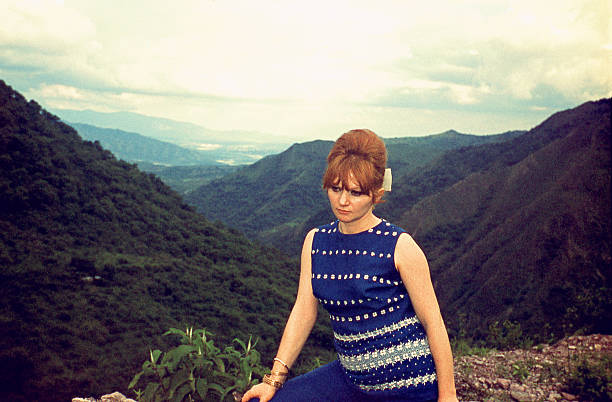 istock Woman from the sixties in nature 609728112