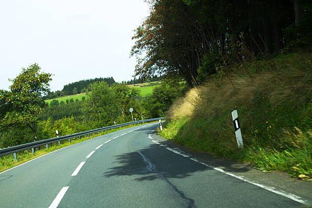 istock Passing curve and road in Sauerland 609790728